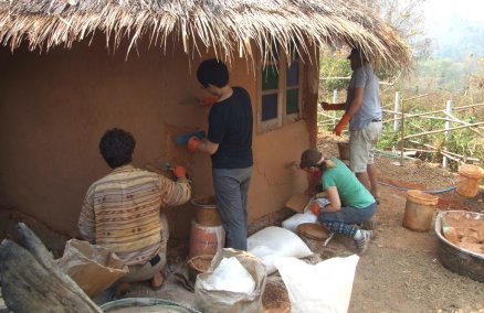 Building a clay house, photo courtesy of maggimck.wordpress.com